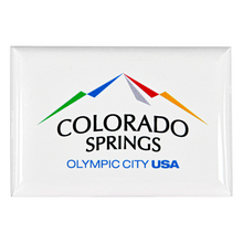 Load image into Gallery viewer, Rectangular, shiny magnet with the Olympic City USA logo printed on a white background
