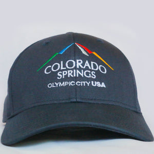 Front view of navy baseball hat with Colorado Springs: Olympic City USA logo embroidered on it 