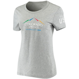 Gray short sleeved t-shirt with full color version of the city of Colorado Springs: Olympic City USA logo. Team USA printed in white on the right sleeve. Team USA tag attached.