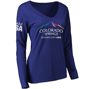 Dark blue long sleeve v-neck shirt with full color city of Colorado Springs: Olympic City USA logo printed in the upper, center of the shirt. Team USA printed on the left upper sleeve.