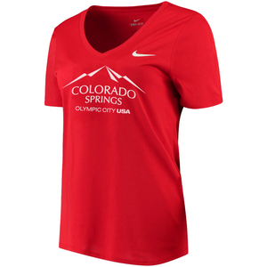 Red short sleeve v-neck t-shirt with white version of the city of Colorado Springs: Olympic City USA logo printed on front. White Nike logo under right shoulder. Team USA and Nike tags attached to right sleeve.